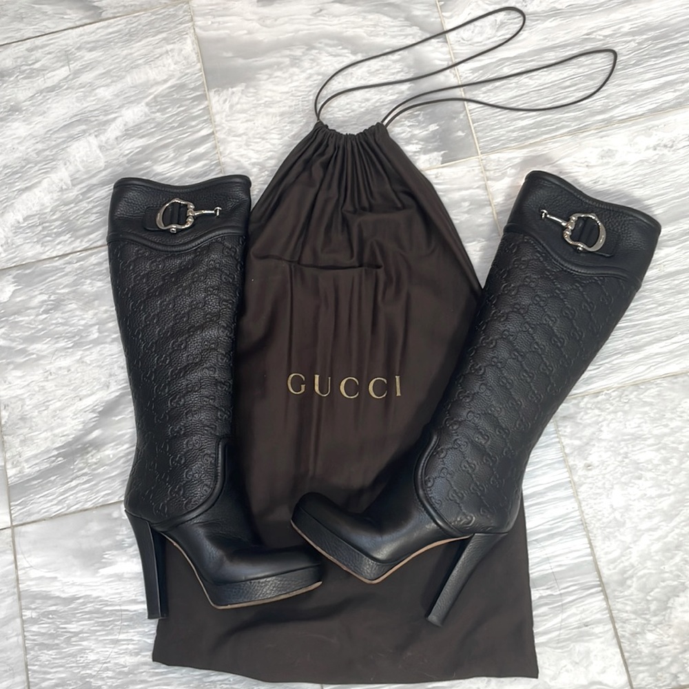 Vintage Knee-high Guccissima platforms in black leather.